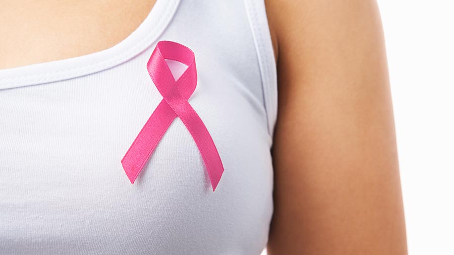 Mujer con el lazo del cáncer. Revisiones ginecológicas Ginetec